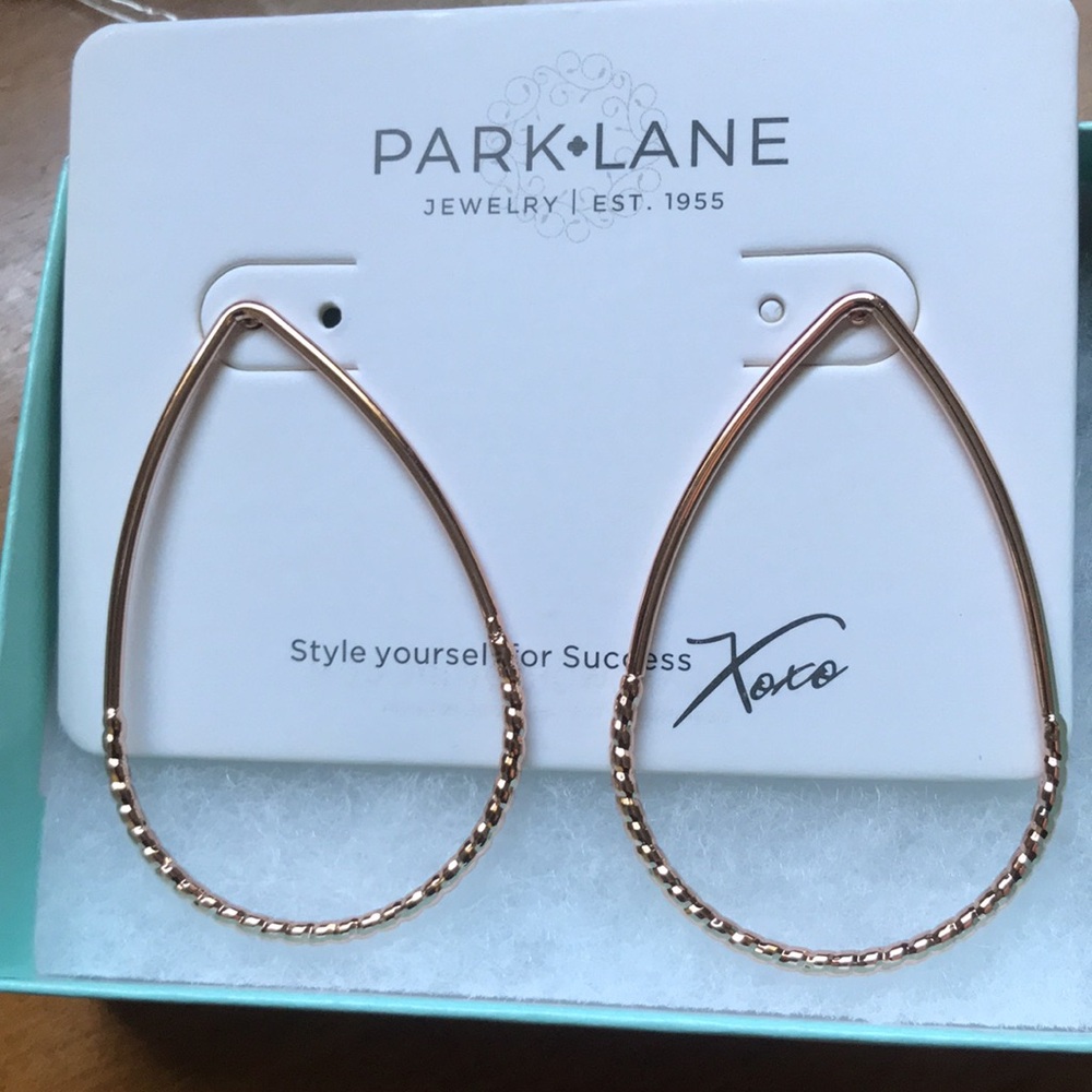 New in box rose gold earrings